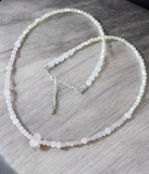 Rose Quartz necklace with moonstone and white jade. features a rose quartz donut