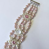 Pink shell pearl bracelet with pink and white charms