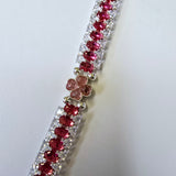 Stunning hot pink and clear rhinestone bracelet with flower spacer