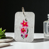 Stunning clear glitter resin pendant with flowers