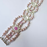 Pink shell pearl bracelet with pink and white charms