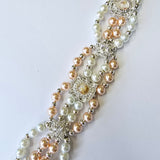 Peach and white shell pearl bracelet with beautiful silver and peach spacers