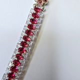Stunning hot pink and clear rhinestone bracelet with flower spacer