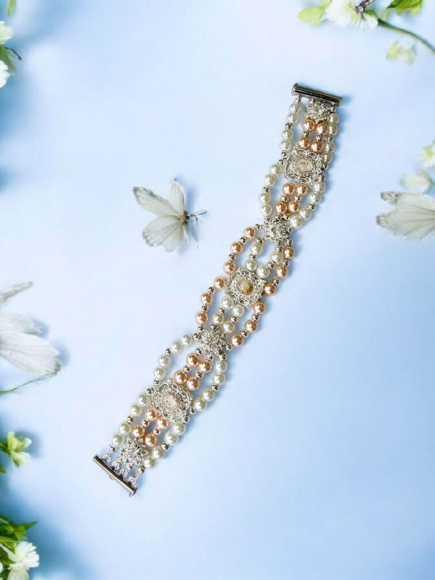 Peach and white shell pearl bracelet with beautiful silver and peach spacers