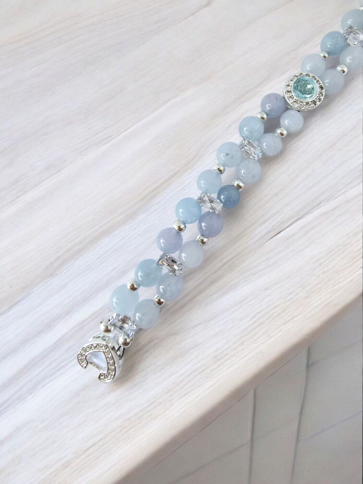 Aquamarine bracelet with clear rhinestones