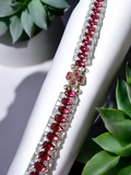 Stunning hot pink and clear rhinestone bracelet with flower spacer