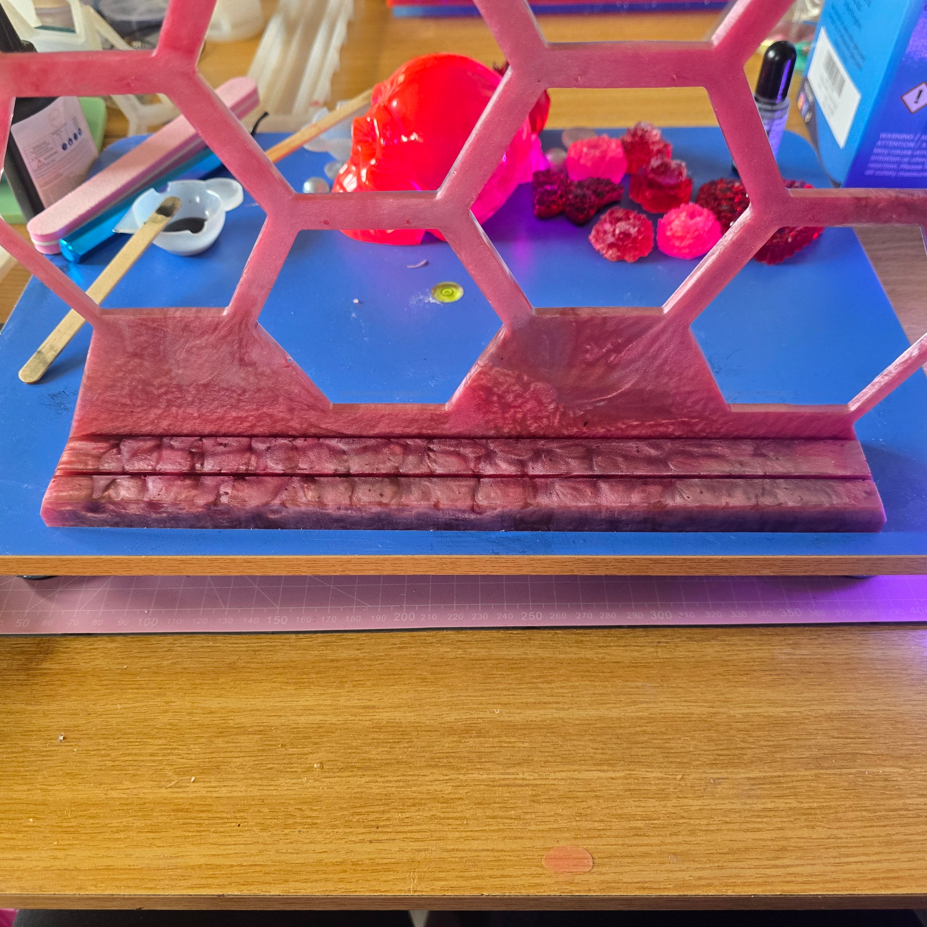 Resin earing stand