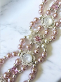 Pink shell pearl bracelet with pink and white charms